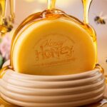 A visually appealing image of a golden honey-infused soap, surrounded by dripping honey droplets. The soap has a natural, earthy look and is nestled in a beehive-inspired holder. The background is a blend of soft, warm colors, with a few bees flying around. The overall ambiance is serene and inviting.